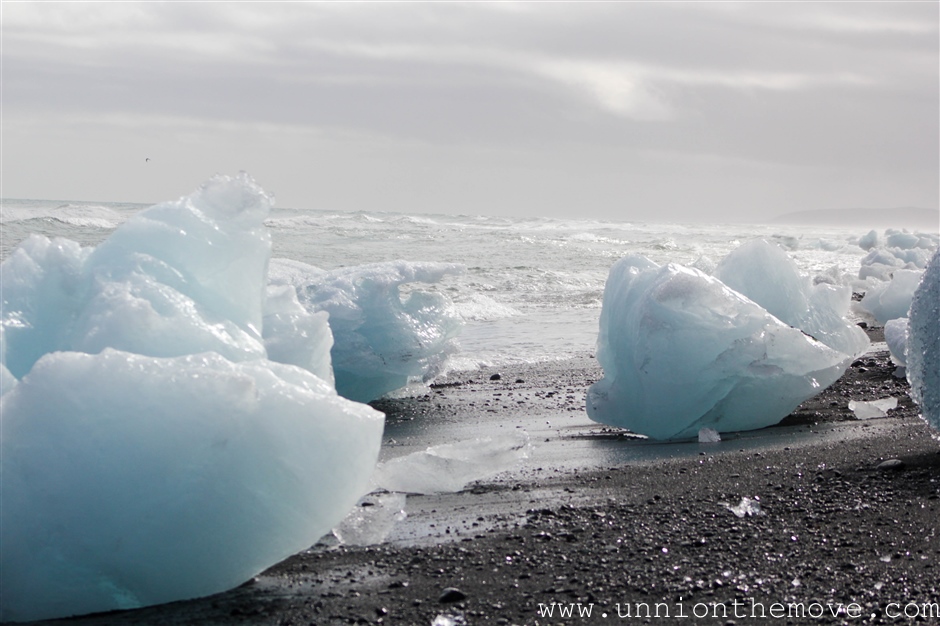 icebergs washed up on the black sand beaches